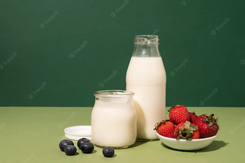 Delicious fruits and milk arrangement Premium Photo