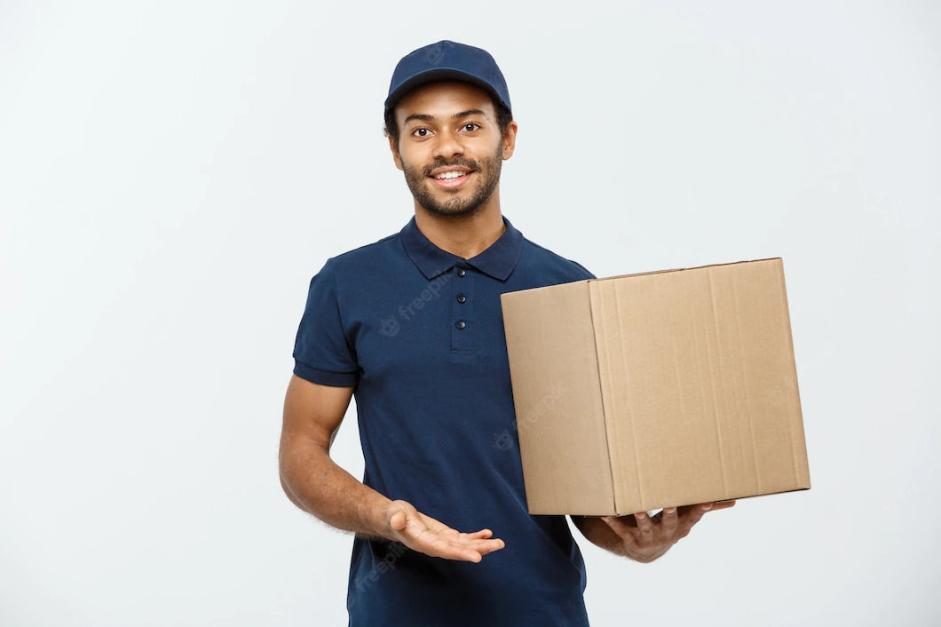 Delivery Concept Portrait Happy African American Delivery Man Red Cloth Holding Box Package Isolated Grey Studio Background Copy Space 1258 1260