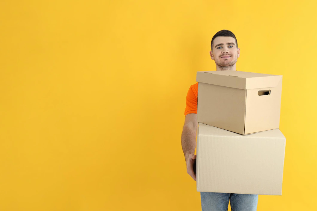 Delivery Guy Hold Boxes Yellow Background 185193 69003