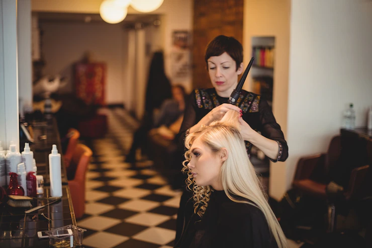Female Hairdresser Styling Clients Hair 107420 94687