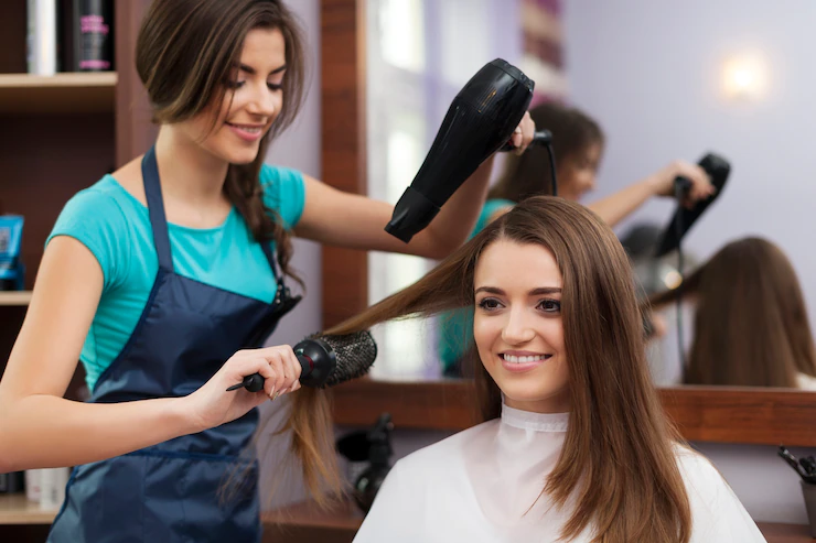 Female Hairdresser Using Hairbrush Hair Dryer 329181 1929