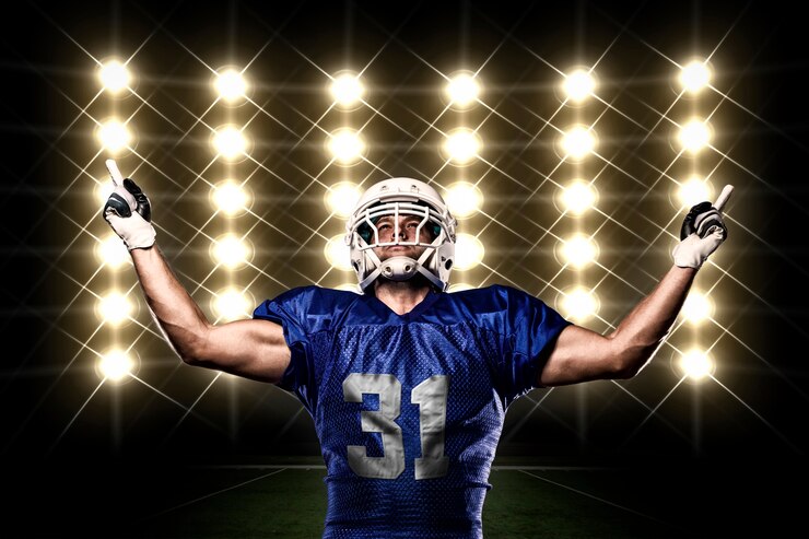 Football Player With Blue Uniform Celebrating Front Lights 306105 787