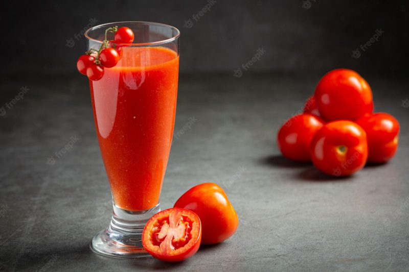 Fresh tomato juice ready to serve Free Photo