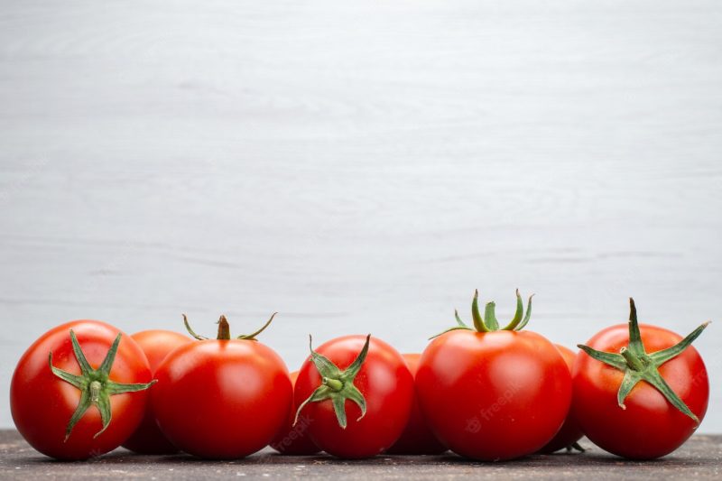 Front close view fresh red tomatoes ripe on the white background vegetable fruit color food Free Photo