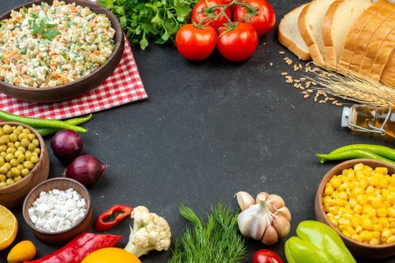 Front view vegetable salad with fresh vegetables and greens on dark background salad health meat ripe meal holiday food Free Photo