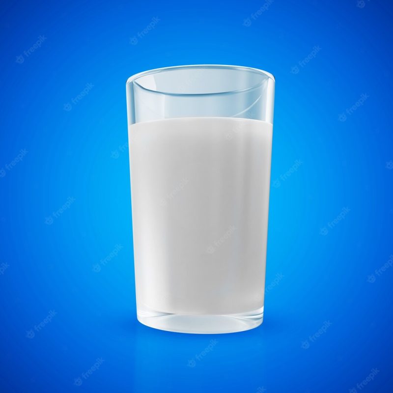 Glass of milk on blue background Premium Photo