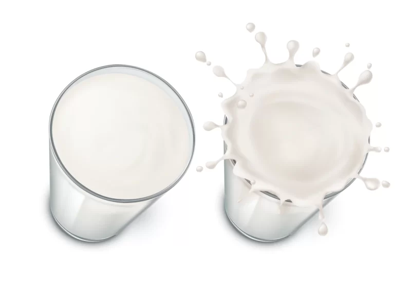 Glasses with milk, splashing in the glass. mock up of farm product isolated Free Vector