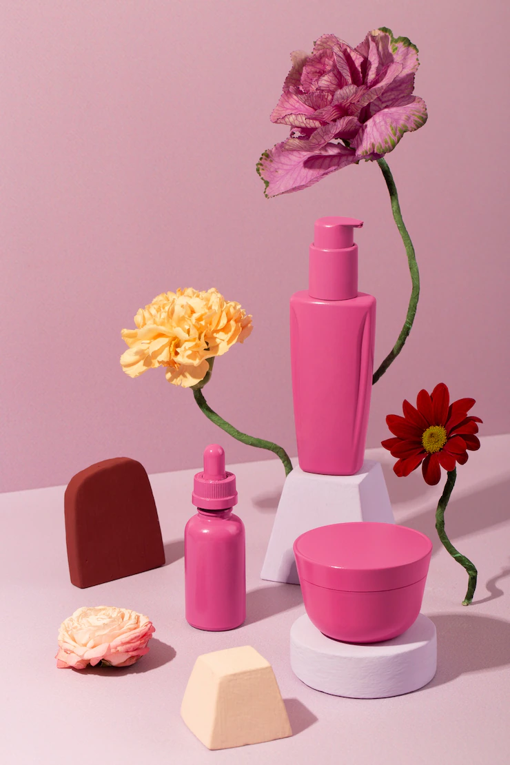 High angle cosmetic containers arrangement Free Photo