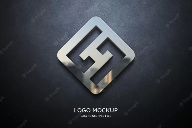 Logo mockup on grey wall Free Psd