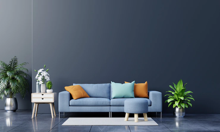 Modern living room interior with sofa and green plants,lamp,table on dark wall background. Free Photo Modern living room interior with sofa and green plants,lamp,table on dark wall background. Free Photo