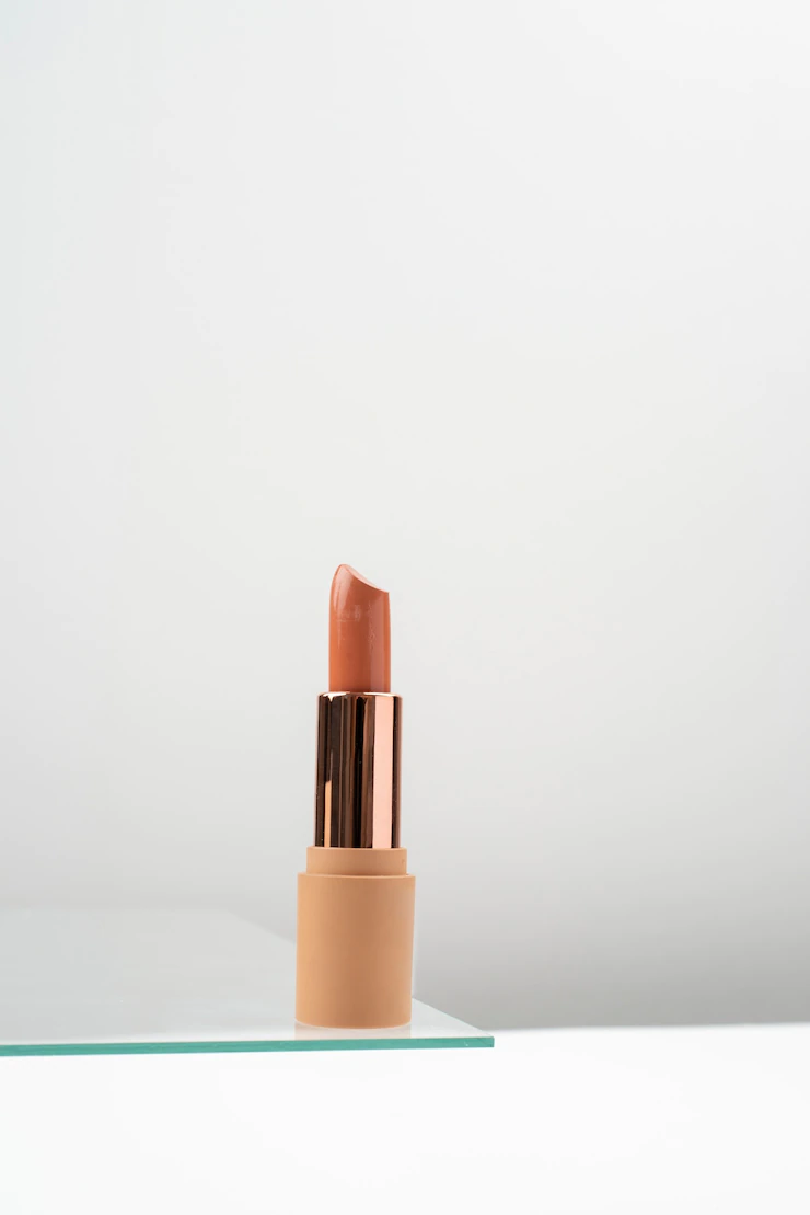 Nude lipstick still life Free Photo