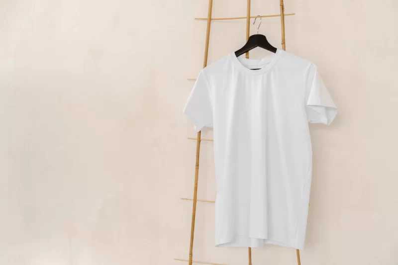 Plain white cotton tshirt on hanger for your design Premium Photo