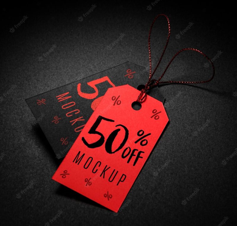 Red and black price tags with thread black Friday sales mock-up Free Psd