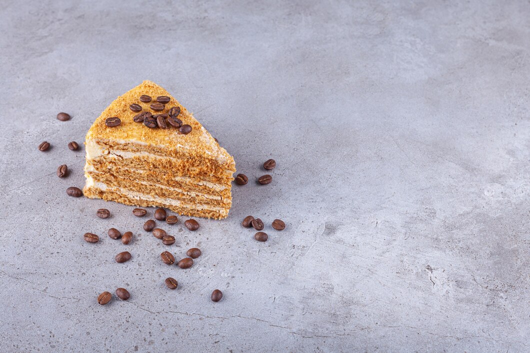 Slice Layered Honey Cake With Coffee Beans Placed Stone Background 114579 54758