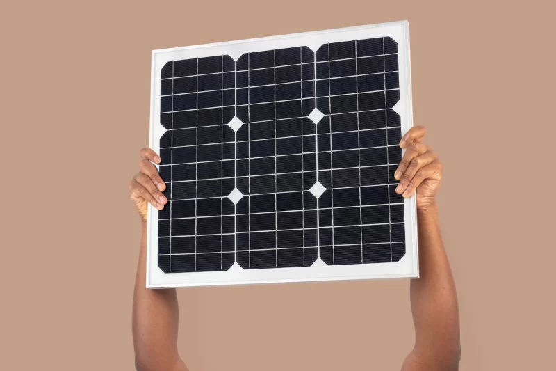 Solar panel hand renewable energy environment Free Photo