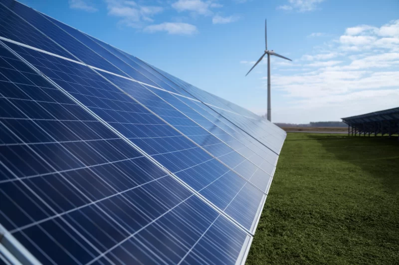 Solar pannels and wind power plant outside Free Photo