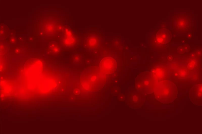 Sparkling red shiny bokeh background design Free Vector