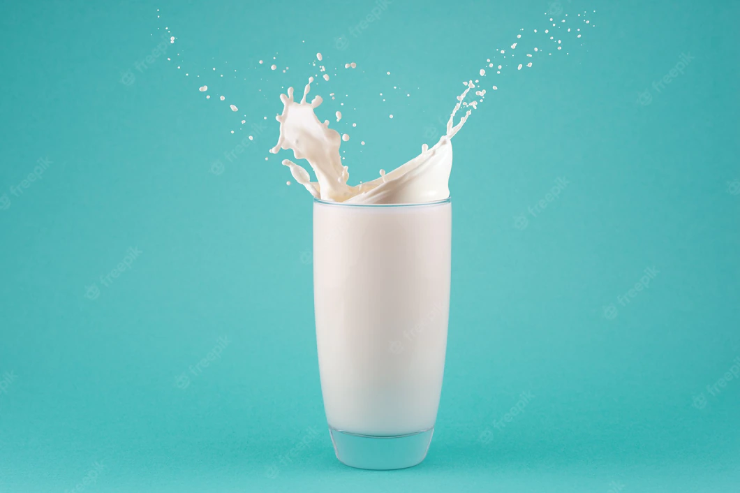 Splashes Milk Glass Isolated Blue Background 200694 288