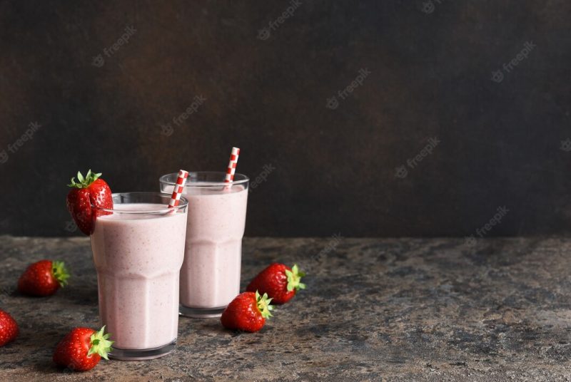 Strawberry cocktail – a milkshake with ice cream and milk. strawberry smoothie for breakfast.