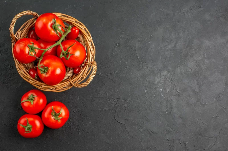 Top view fresh red tomatoes inside basket Free Photo