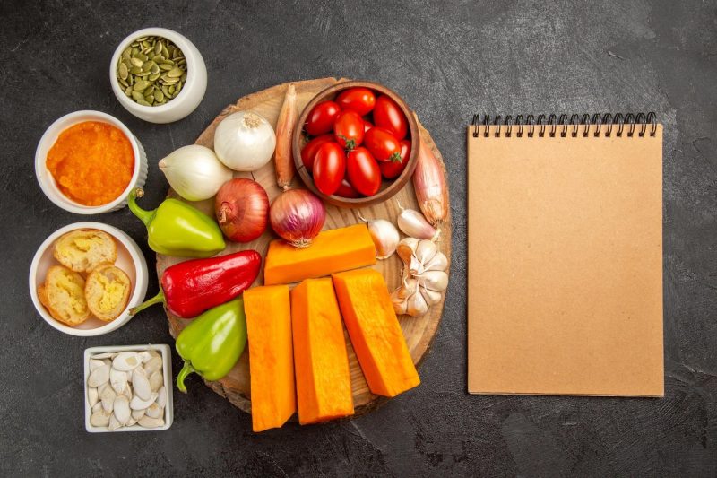 Top view fresh vegetables with pumpkin and seeds on the dark background salad ripe meal color Free Photo