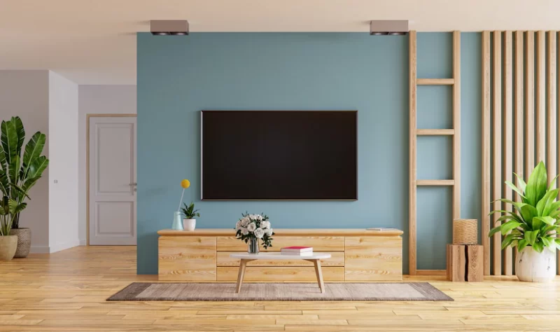 Tv led on the cabinet in modern living room on blue wall background,3d rendering Free Photo Tv led on the cabinet in modern living room on blue wall background,3d rendering Free Photo