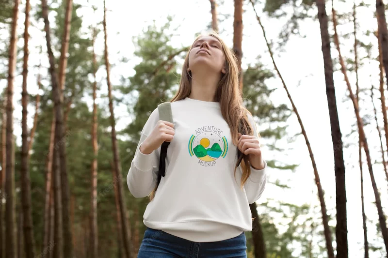 Young adult wearing forest apparel tshirt Free Psd