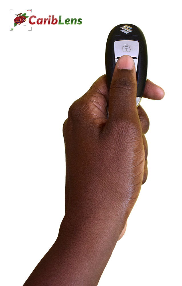 African Black Hand Pressing Open Button On Car Key Free Image Download