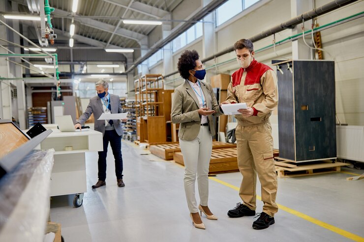 African American Businesswoman Male Worker Wearing Face Masks While Examining Reports Wood Factory 637285 11861