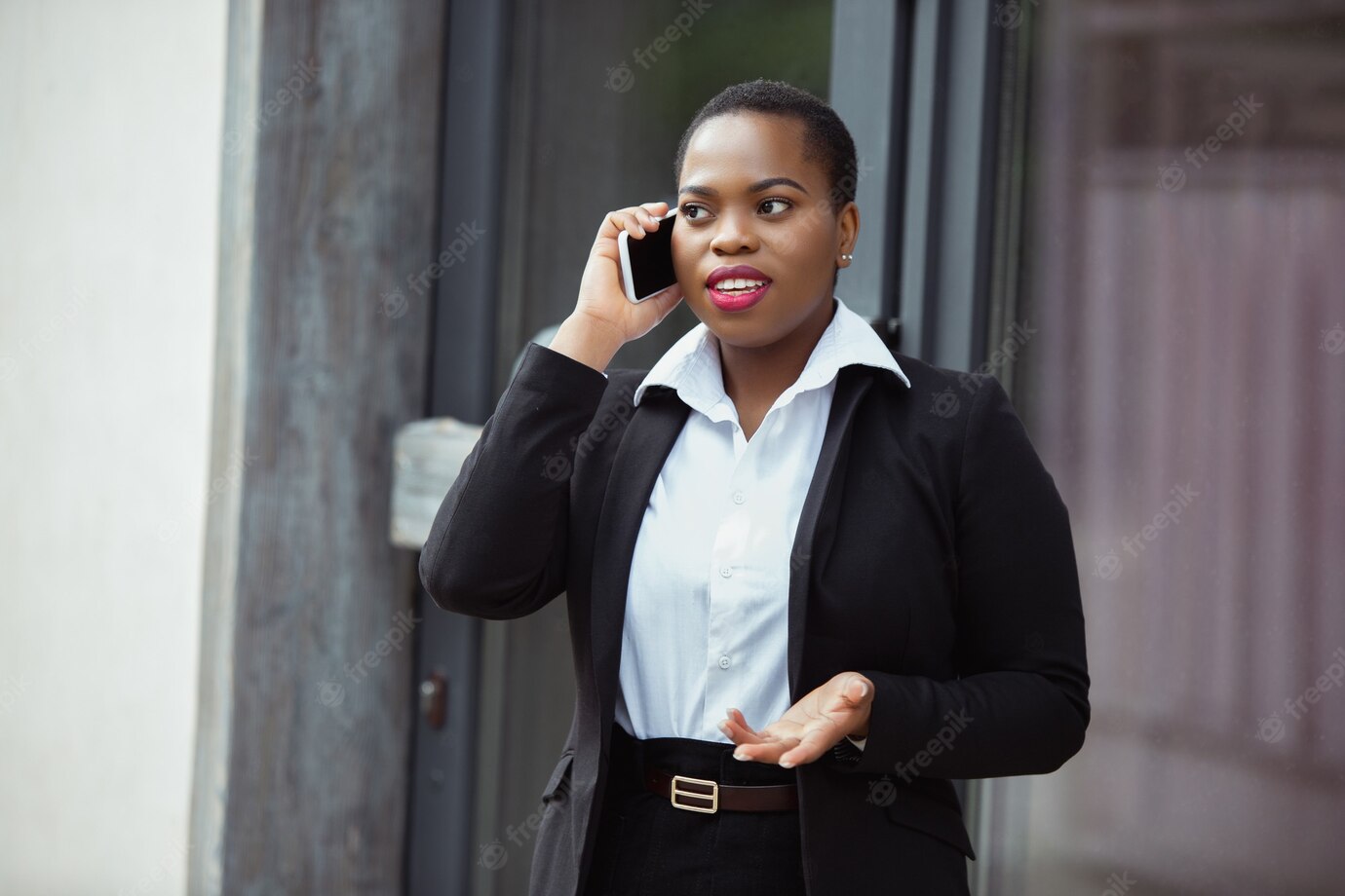 African American Businesswoman Office Attire Smiling Looks Confident Talking Phone 155003 42332