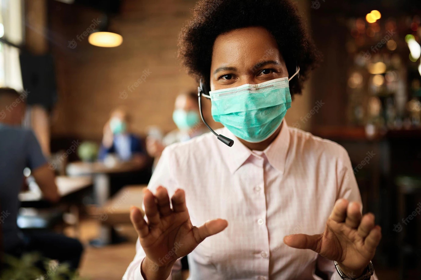 African American Businesswoman With Face Mask Having Video Call While Sitting Cafe 637285 8142