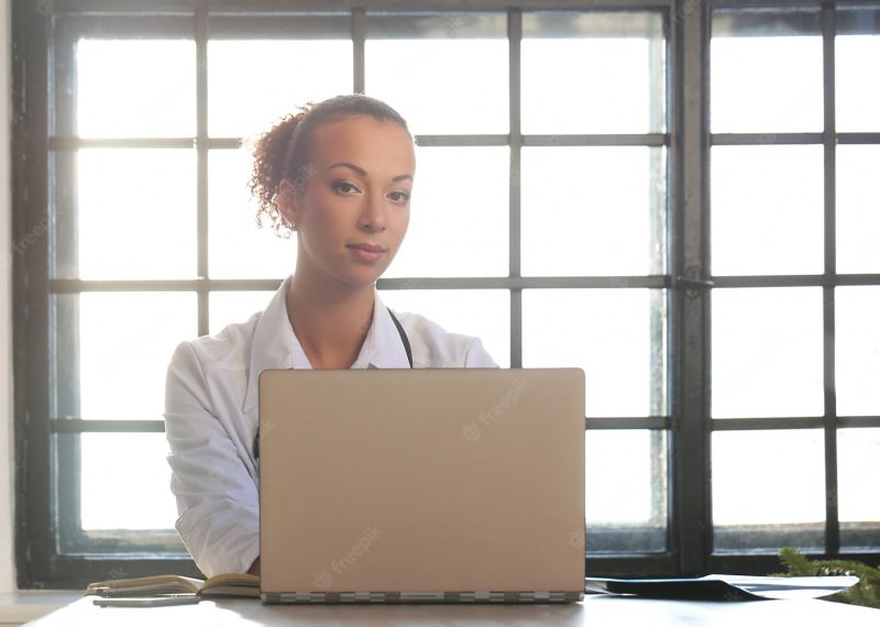 African American female doctor posing, medicine specialist Free Photo