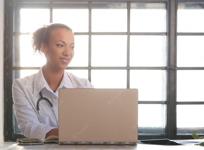 African American female doctor posing, medicine specialist Free Photo