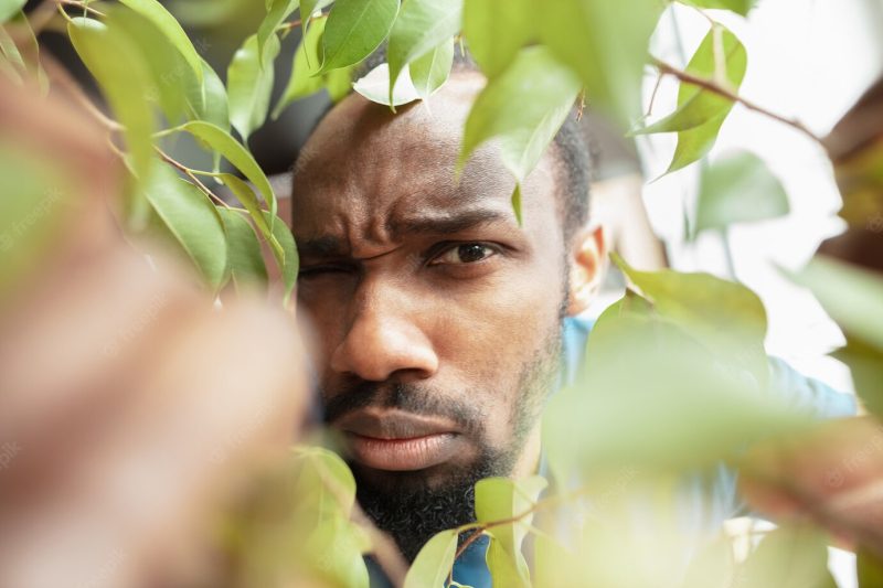 African-American man looking for job in unusual places at his home Free Photo