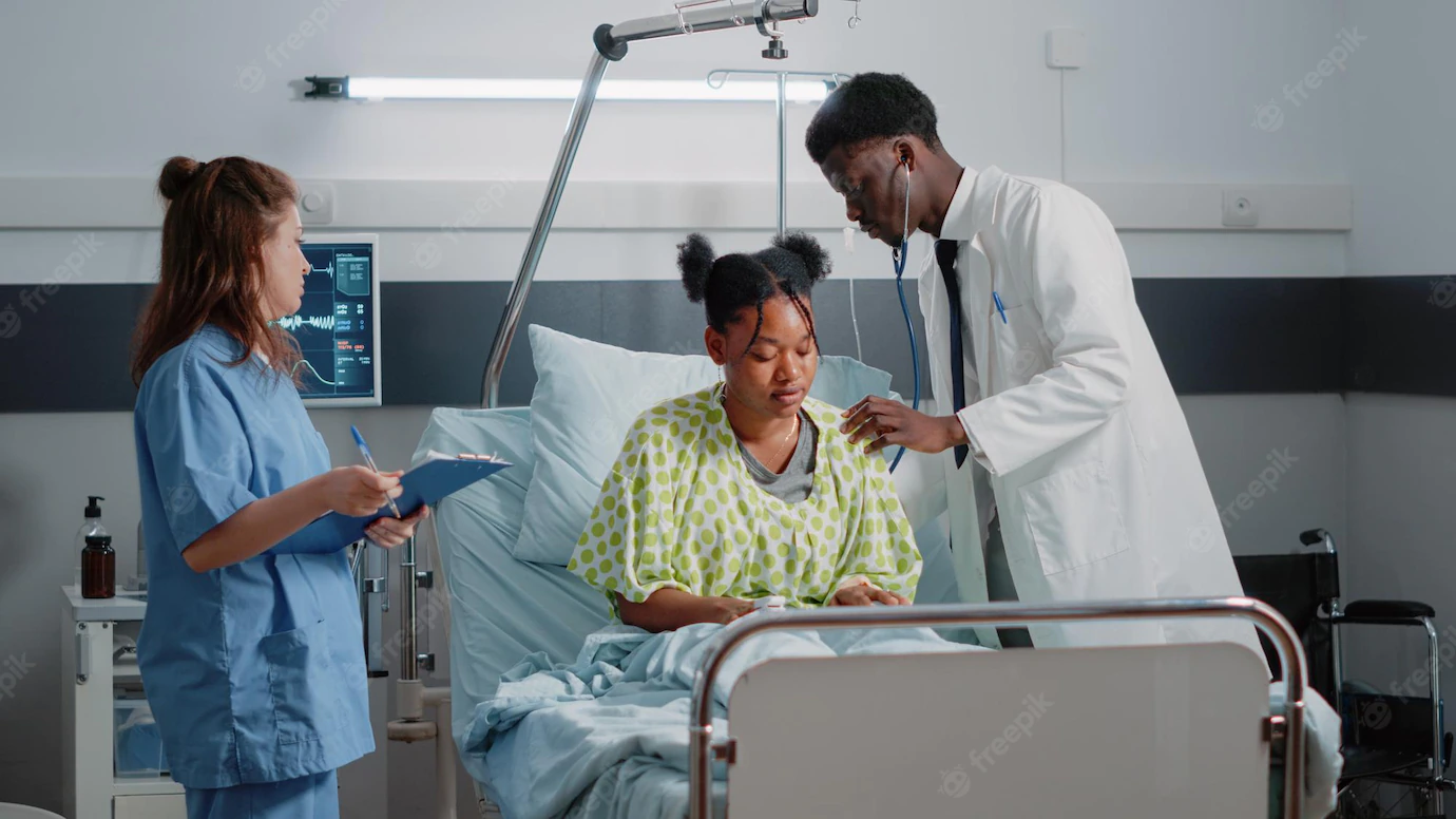 African American Medic Using Stethoscope Ill Patient Check Heartbeat Examination Cure Sickness Specialist Doing Healthcare Consultation While Nurse Giving Assistance 482257 40056