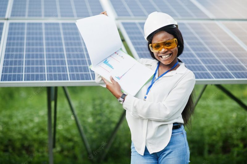 African american technician check the maintenance of the solar panels black woman engineer at solar station Free Photo