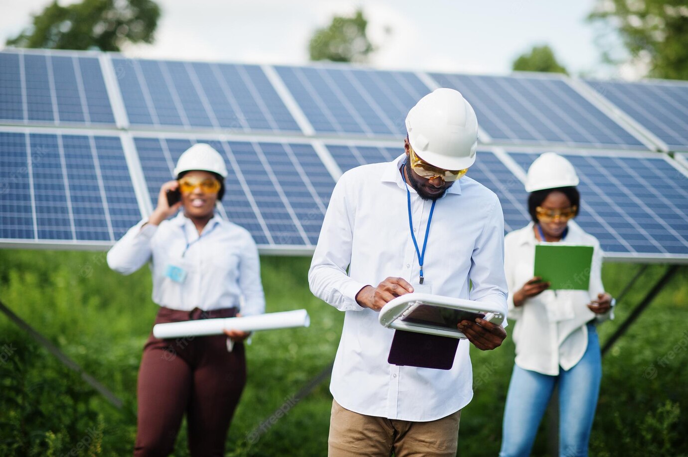 African American Technician Checks Maintenance Solar Panels Group Three Black Engineers Meeting Solar Station 627829 4783