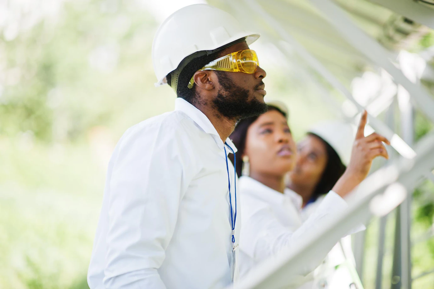 African American Technician Checks Maintenance Solar Panels Group Three Black Engineers Meeting Solar Station 627829 4860