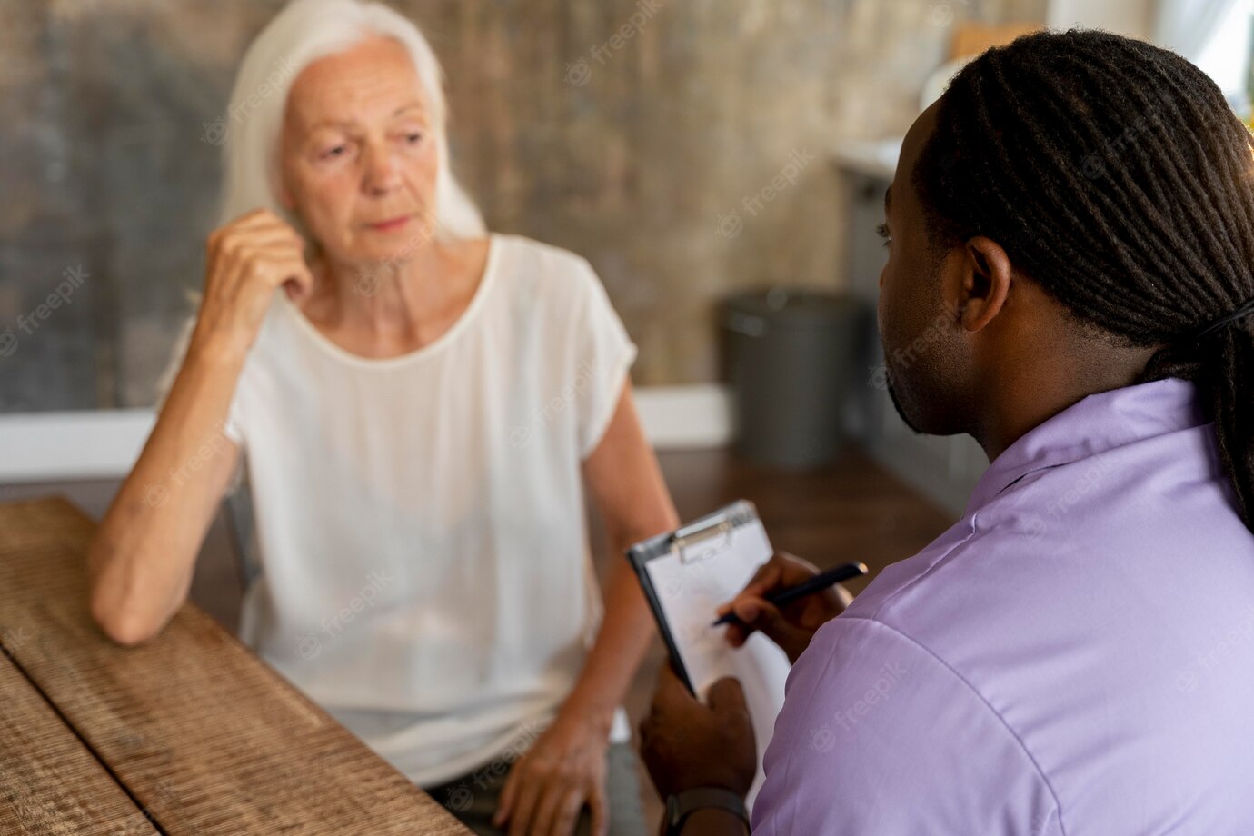 African Social Worker Helping Senior Woman 23 2149031381