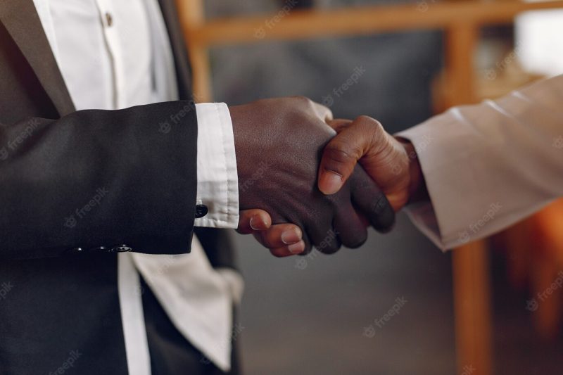 Black men in a cafe having a business Free Photo