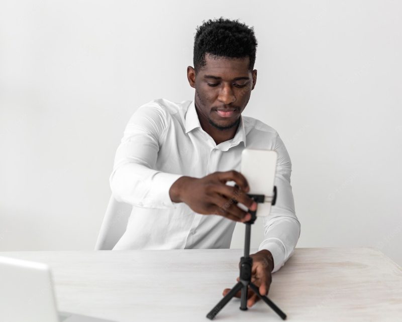 Business African American man ready for a video call Free Photo