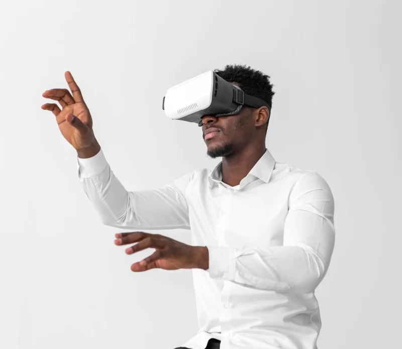 Business African American man using virtual reality headset Free Photo