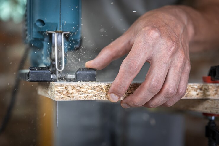 Close Up Carpenter S Hands Process Cutting Wood With Jigsaw 169016 13109