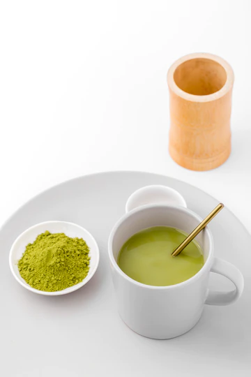 Close Up Cup With Matcha Tea Powder 23 2148377636