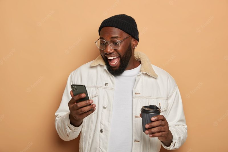 Close up on young handsome man isolated Free Photo