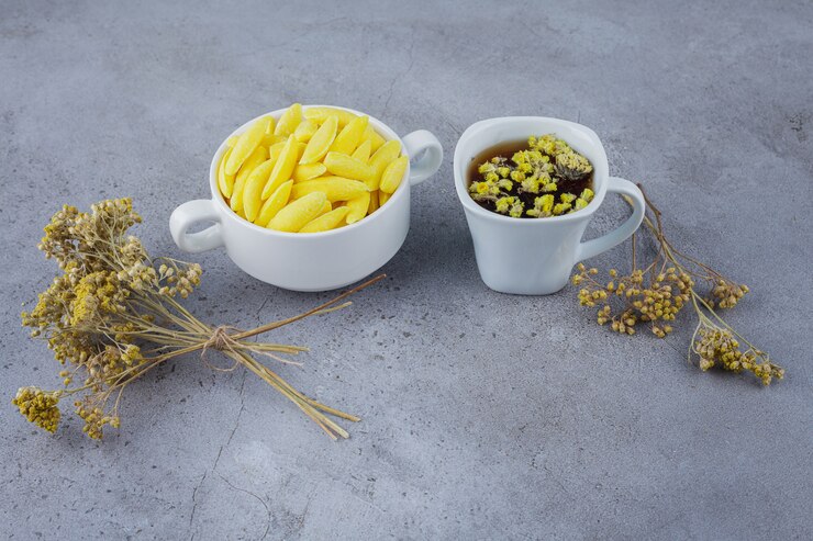 Cup Hot Tea With White Bowl Yellow Candies Stone 114579 48771