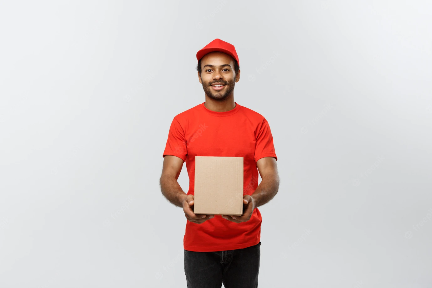 Delivery Concept Portrait Happy African American Delivery Man Red Cloth Holding Box Package Isolated Grey Studio Background Copy Space 1258 1180