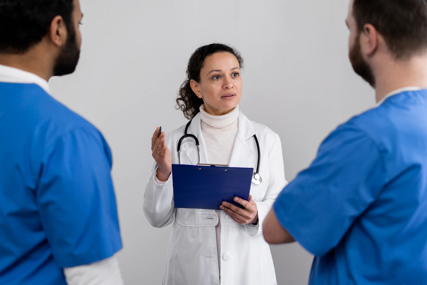 Doctor Discussing With Nurses Work 23 2149309994