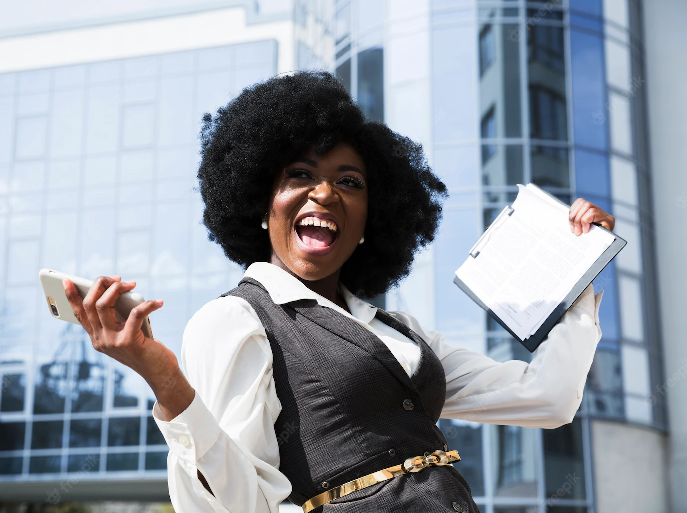 Excited Young African Businesswoman Holding Mobile Phone Clipboard 23 2148190735