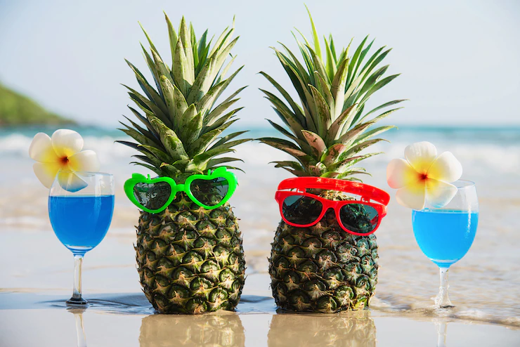 Fresh Couple Pineapples With Sun Glasses Cocktail Glasses Clean Sand Beach With Sea Wave Fresh Fruit Drink With Sea Sand Sun Vacation Concept 1150 13740